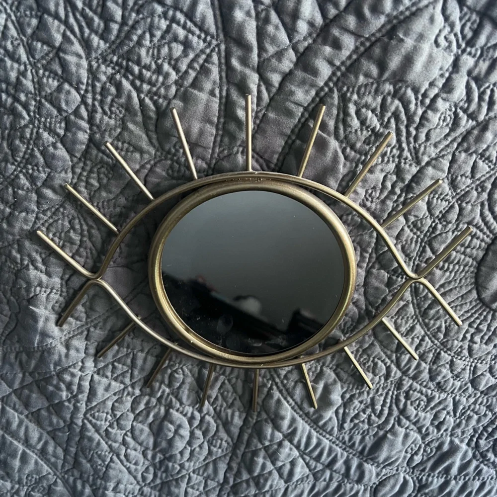 Like new gold metal eye mirror